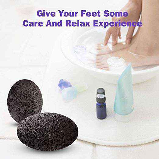 Black pumice stones beside a foot spa bowl