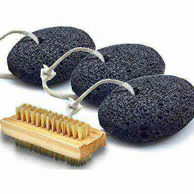 Black volcanic pumice stones on rope loops with a wooden foot brush