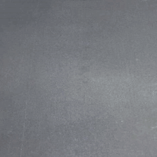 Honed Ash Black basalt surface with an even charcoal tone