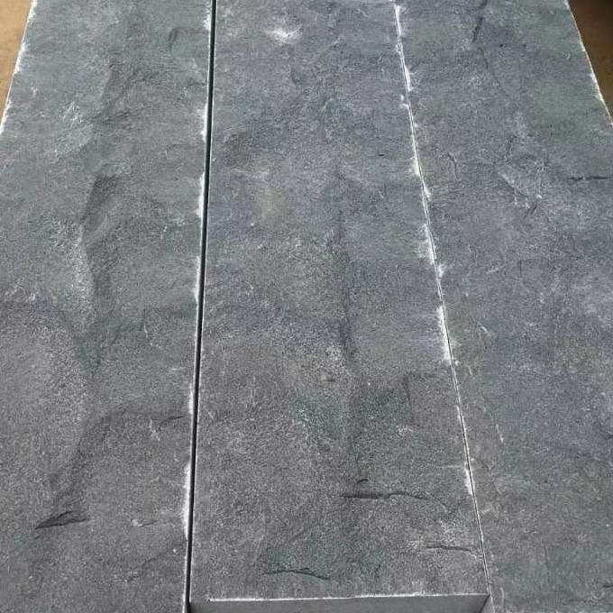 Split Ash Layout Natural split Ash Black basalt tiles laid on the floor