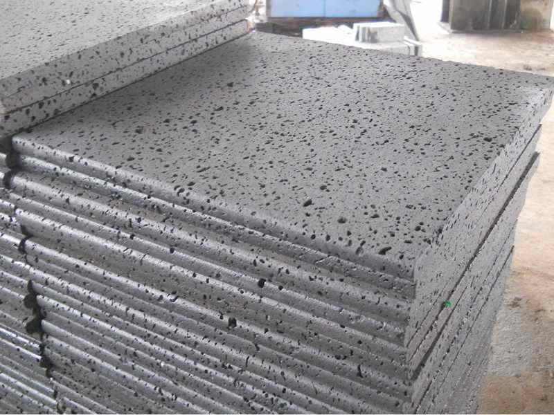 Black basalt lava stone pool coping slabs with rounded edge, stacked