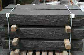 Mongolia Black basalt steps stacked with timber spacers and straps